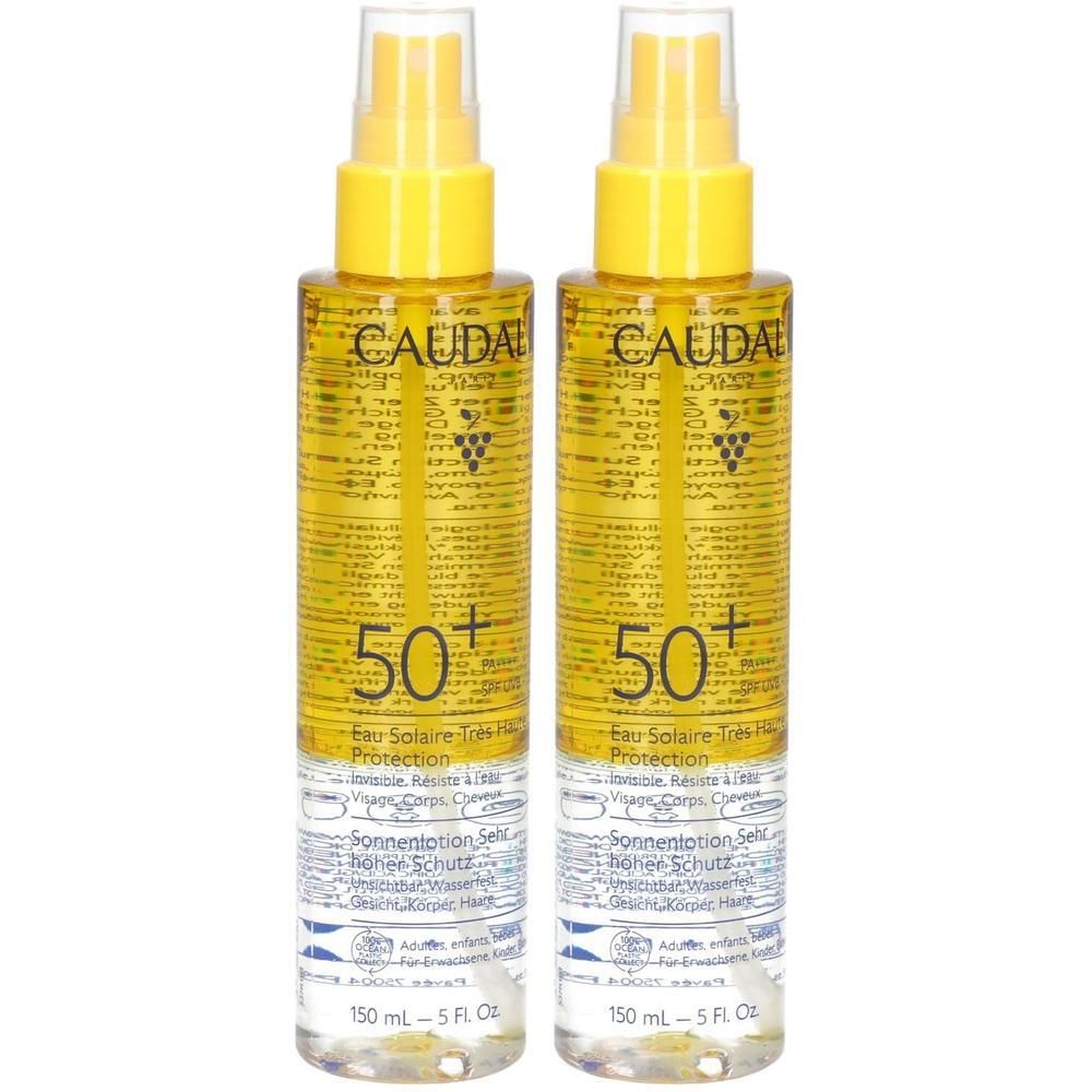 Zwei gelbe Sprühflaschen Caudalie Sonnenschutz LSF 50+, 150 ml.