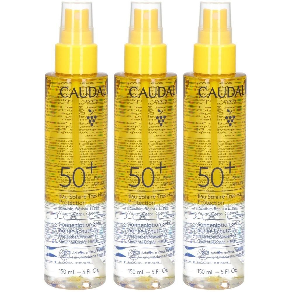 Drei Caudalie Sonnenöl Flaschen mit 50+ Sonnenschutz. Klare Flüssigkeit in transparenten Sprühflaschen mit gelben Verschlüssen.