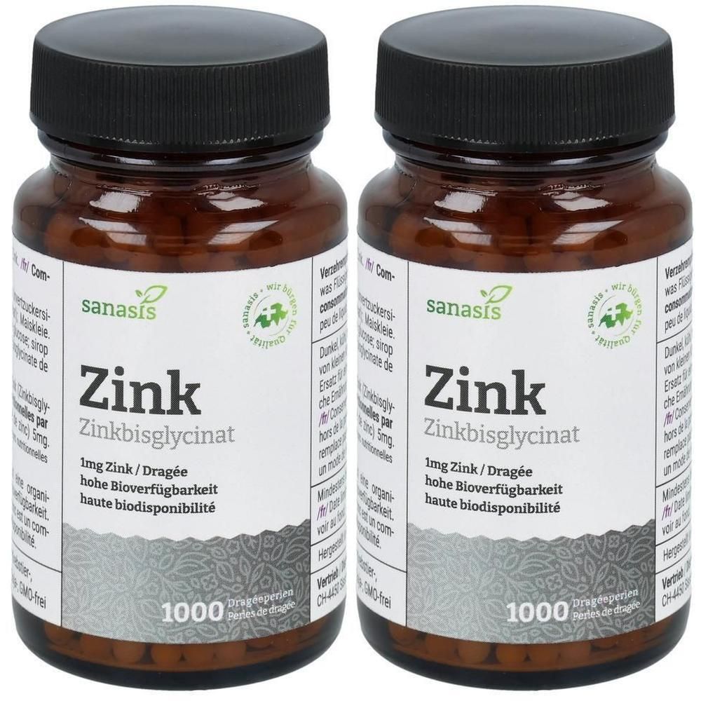 Zwei Braunglasflaschen mit schwarzen Schraubverschlüssen, gefüllt mit Zink-Dragees. Etikett mit "sanasis Zink Zinkbisglycinat" und "1000".