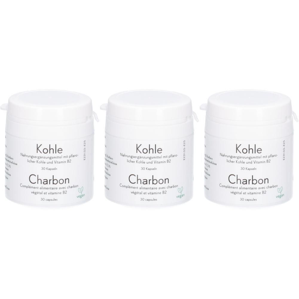 Drei weiße Behälter mit Kohle Charbon Kapseln, Nahrungsergänzungsmittel.