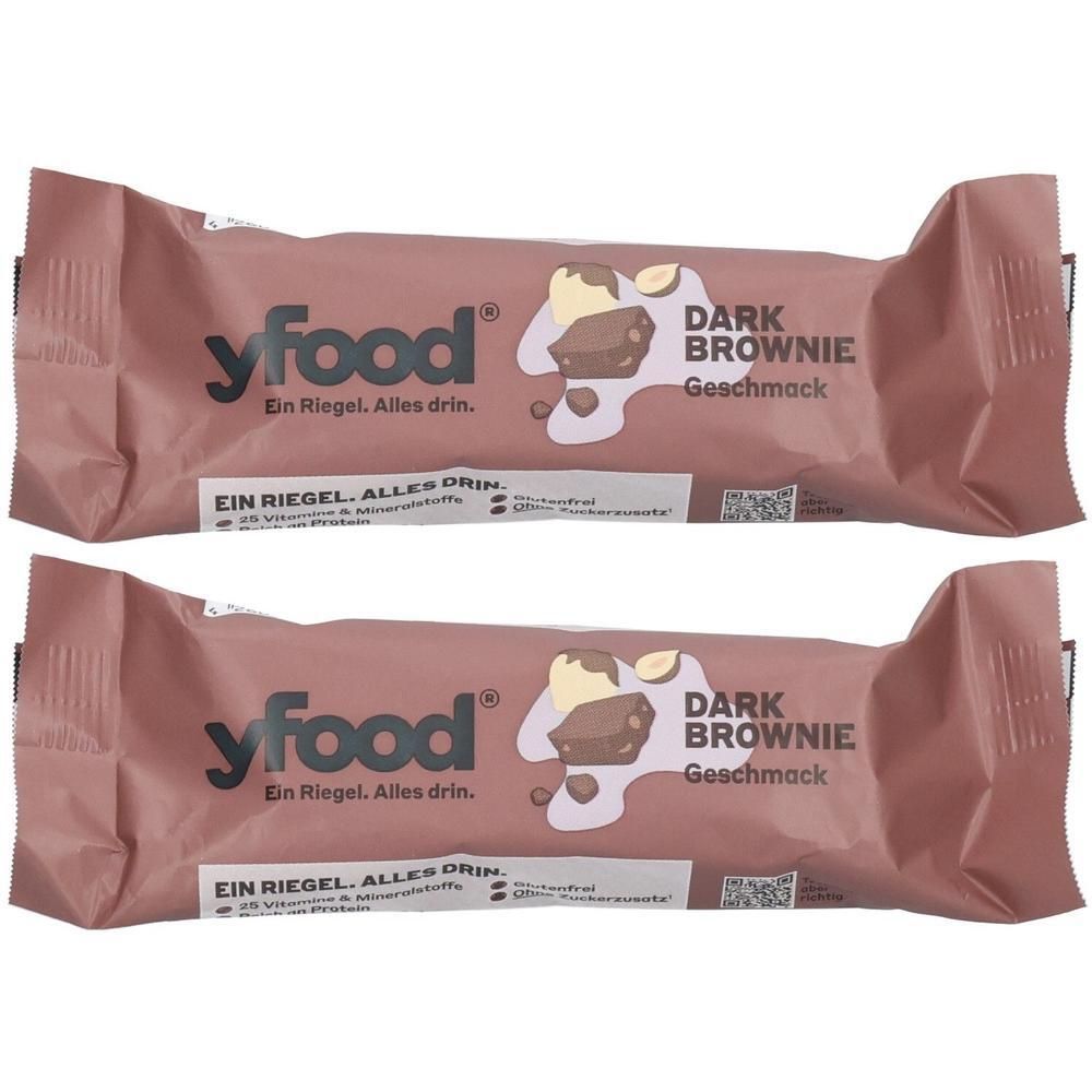 Zwei Riegel yfood Dark Brownie Geschmack mit Schokoladenabbildung.