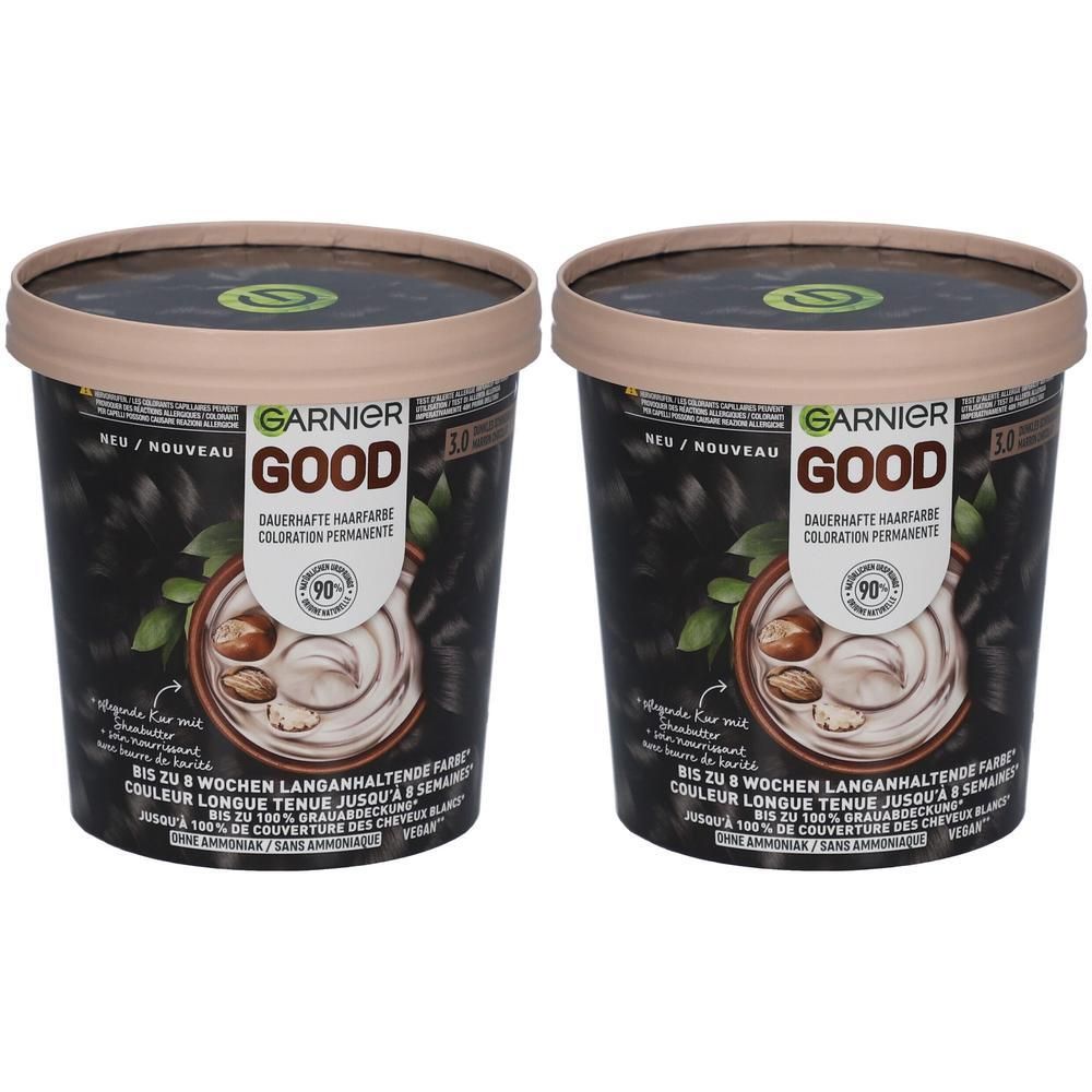 Deux pots de coloration capillaire Garnier Good. Brun foncé, 90% d'ingrédients d'origine naturelle. Couvercles avec logo et nom du produit.