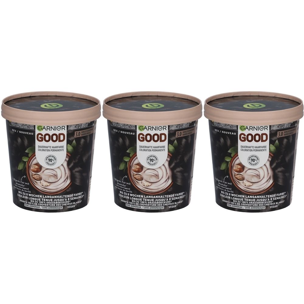 Trois boîtes de coloration Garnier Good. Récipients noirs avec couvercles bruns. Inscription : Garnier Good, 99% d'ingrédients d'origine naturelle.