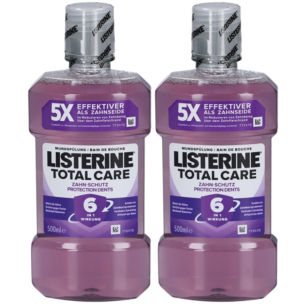 Zwei Flaschen LISTERINE Total Care. Lila Flüssigkeit in transparenten Flaschen. Silberne Deckel. Text: 5X effektiver als Zahnseide, 6 in 1 Wirkung.