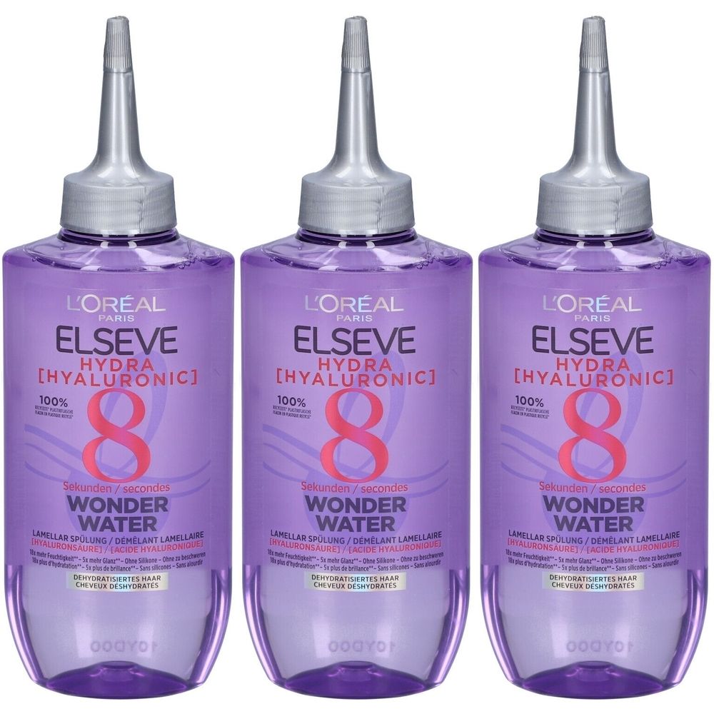 Trois flacons de liquide violet. Chaque flacon porte l'inscription "L'Oréal Paris Elseve Hydra Hyaluronic 8 Wonder Water".
