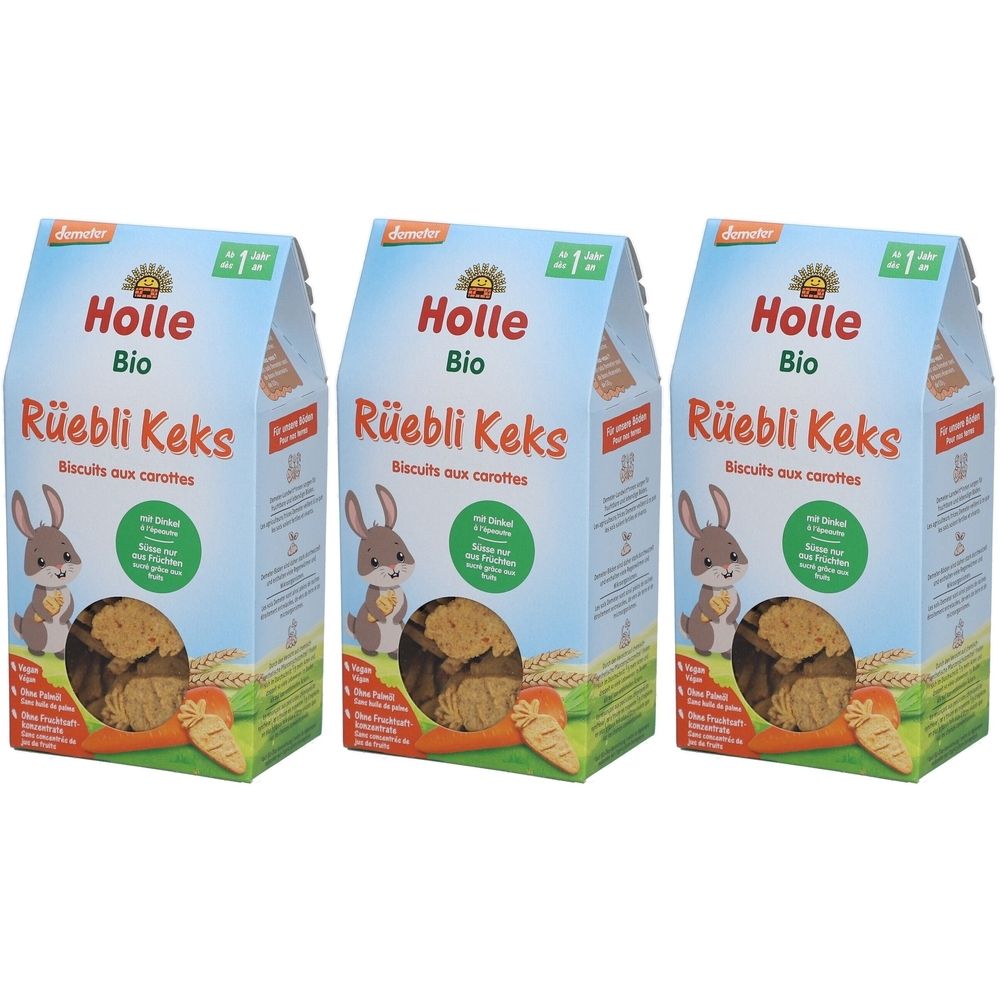 Drei Packungen Holle Bio Rüebli Keks. Hellblaue Verpackung mit Hase, Karotten und Keksen. Text: Rüebli Keks, Biscuits aux carottes.