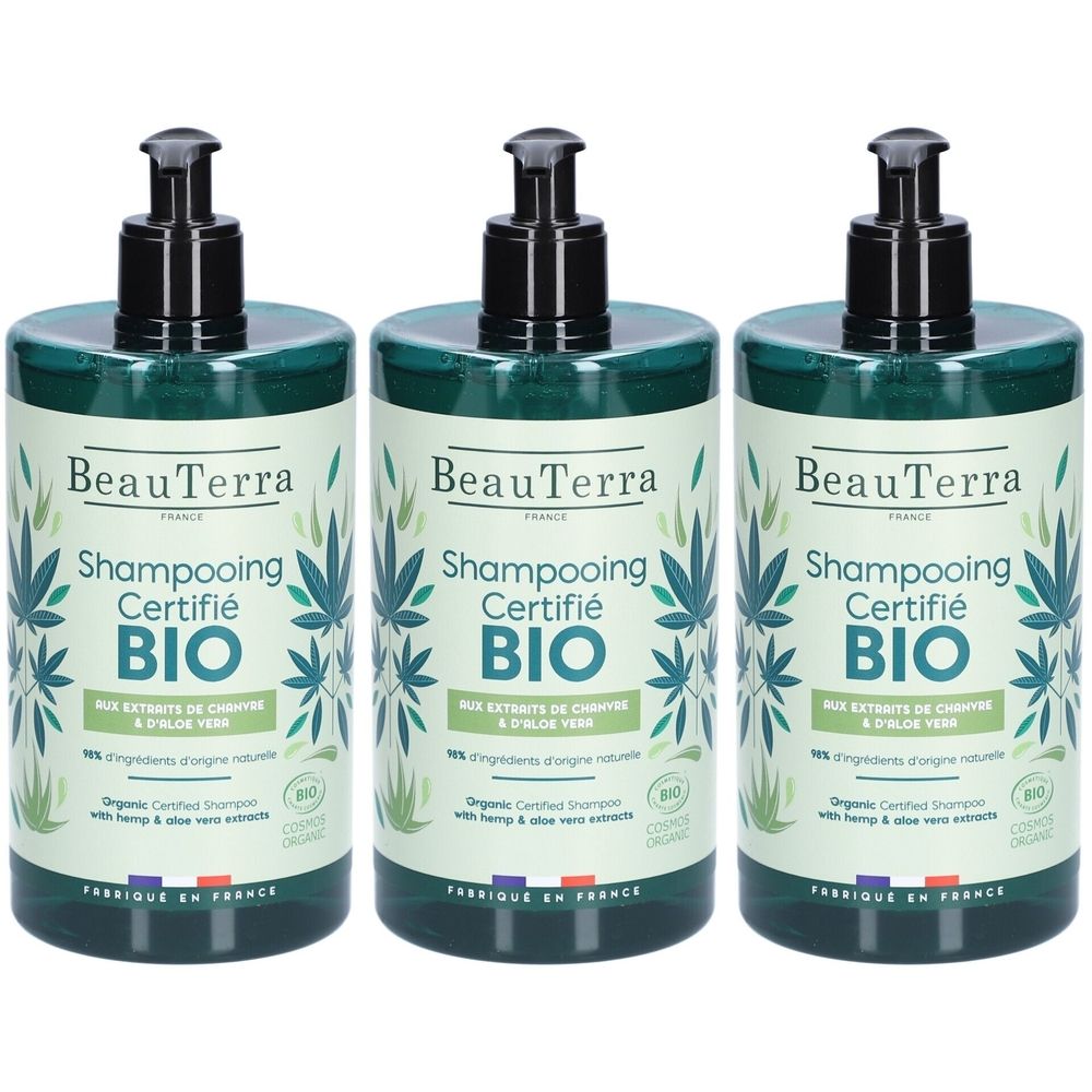 Trois flacons de shampooing verts avec pompes noires. Étiquettes : "BeauTerra", "Shampooing Certifié BIO" et "Fabriqué en France".