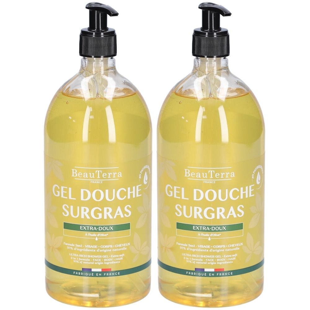 Zwei durchsichtige Flaschen mit gelbem Duschgel. Schwarzer Pumpkopf. Aufschrift: Gel Douche Surgras, Extra-Doux. Hergestellt in Frankreich.