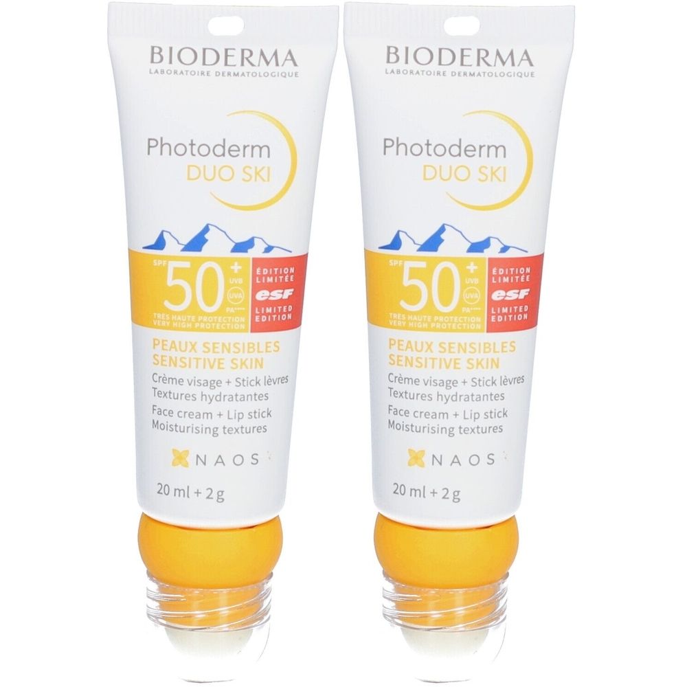 Zwei Tuben BIODERMA Photoderm Duo Ski. Weiße Tuben mit gelben Akzenten. Aufschrift: 50+ SPF, Peaux Sensibles, 20ml + 2g.