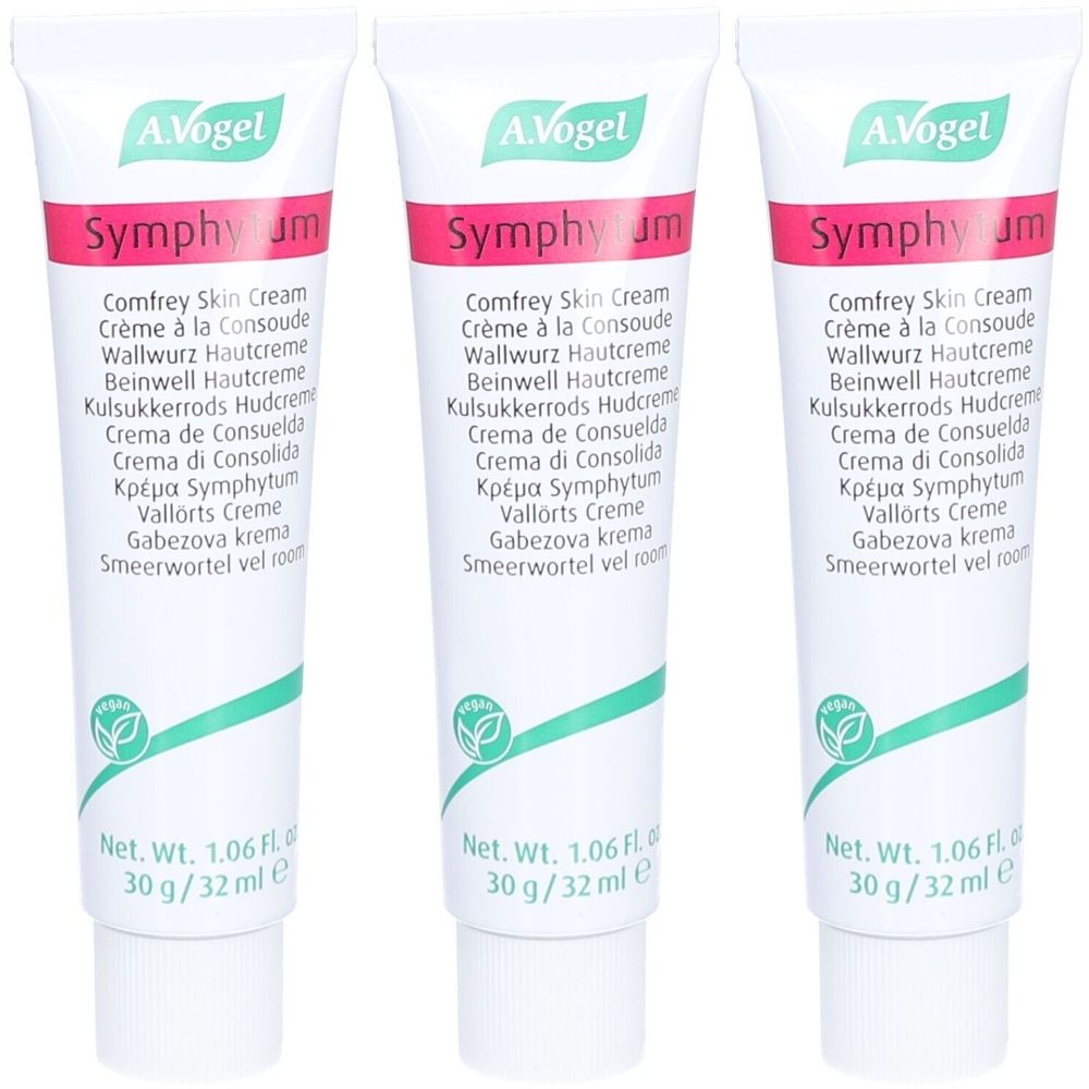 Trois tubes de crème. Blancs, avec une bande rouge et du texte. A. Vogel et Symphytum sont lisibles. Label vegan.