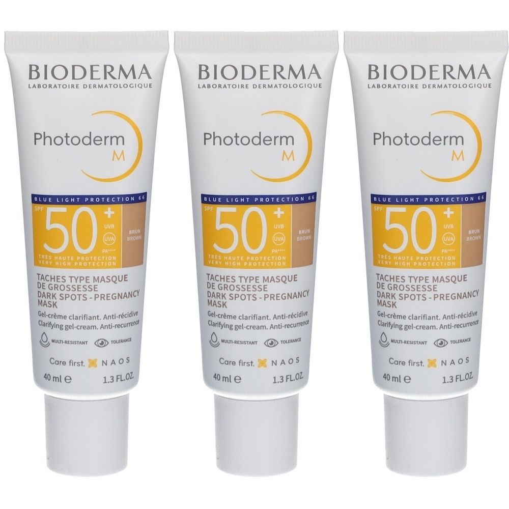 Drei Tuben Bioderma Photoderm M. Auf jeder Tube steht SPF 50 und weitere Informationen. Die Tuben sind weiß mit gelben Akzenten.