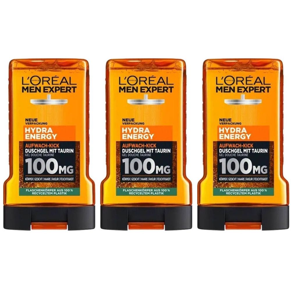 Trois flacons de gel douche L'Oréal Men Expert Hydra Energy. Emballage orange avec bouchon noir. Texte : Hydra Energy, 100mg.