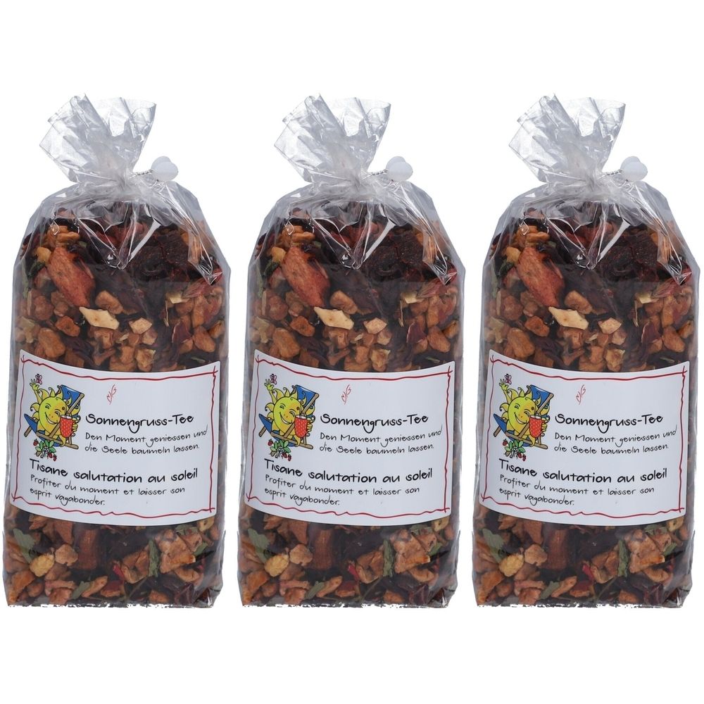 Trois sachets de thé. Chaque sachet est emballé dans du papier transparent et étiqueté. L'étiquette indique "Sonnengruss-Tee".