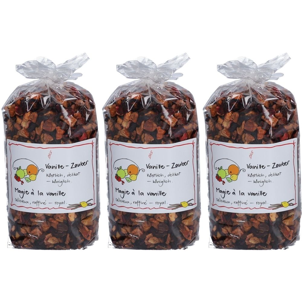 Drei Beutel Früchtetee Vanille-Zauber. Klare Plastikverpackung mit Etikett. Aufschrift: Vanille-Zauber, Magie à la vanille.