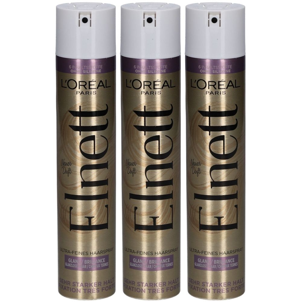 Drei Haarsprays mit weißem Deckel und goldener Dose. Aufschrift: Elnett, L'Oréal Paris. Glanz, ultra-feines Haarspray.