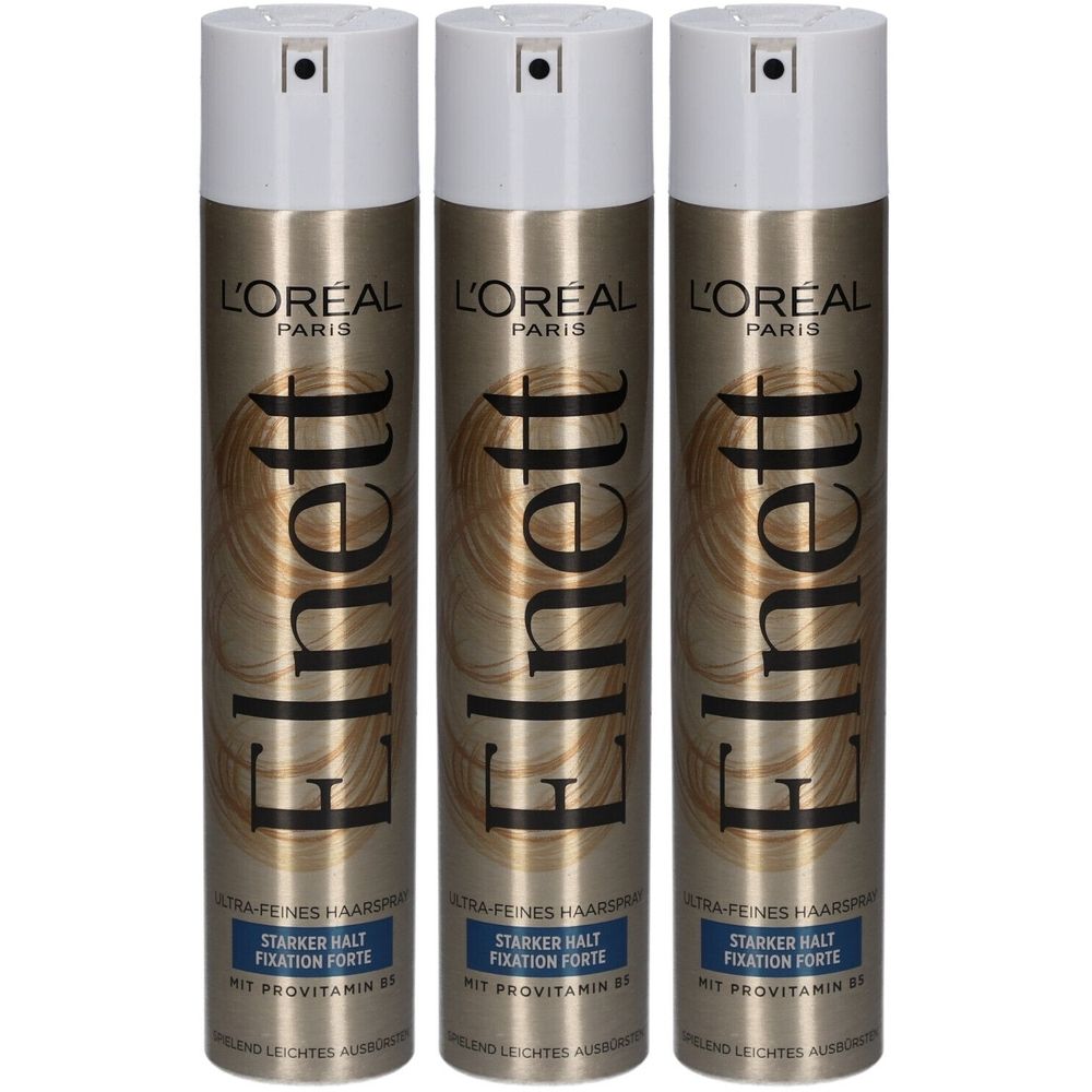 Drei Haarspray-Dosen. Aufschrift: L'Oréal Paris, Elnett. Starker Halt, mit Vitamin B5. Weiße Sprühköpfe, silberne Dosen.