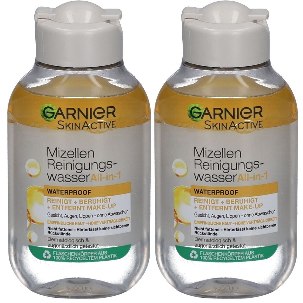 Zwei Flaschen Garnier SkinActive Mizellen Reinigungswasser. Klare Flüssigkeit mit gelbem Rand. Weißer Deckel. Text: Waterproof, Reinigt + beruhigt + entfernt Make-up.