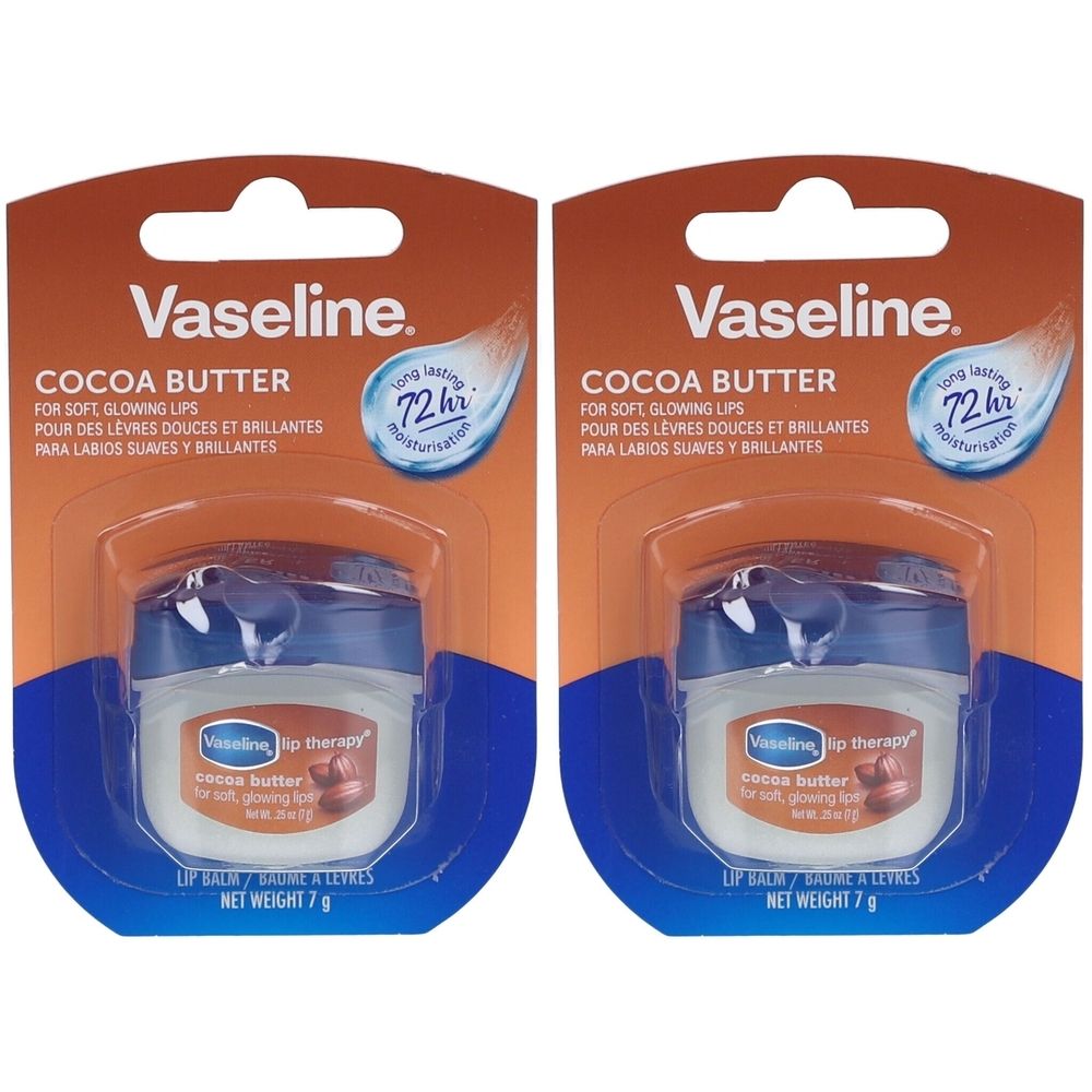 Zwei Vaseline Lippenbalsam Kakaobutter in Blisterverpackung. Weiße Tiegel mit blauem Deckel. Aufschrift: Cocoa Butter, 72h Feuchtigkeit.