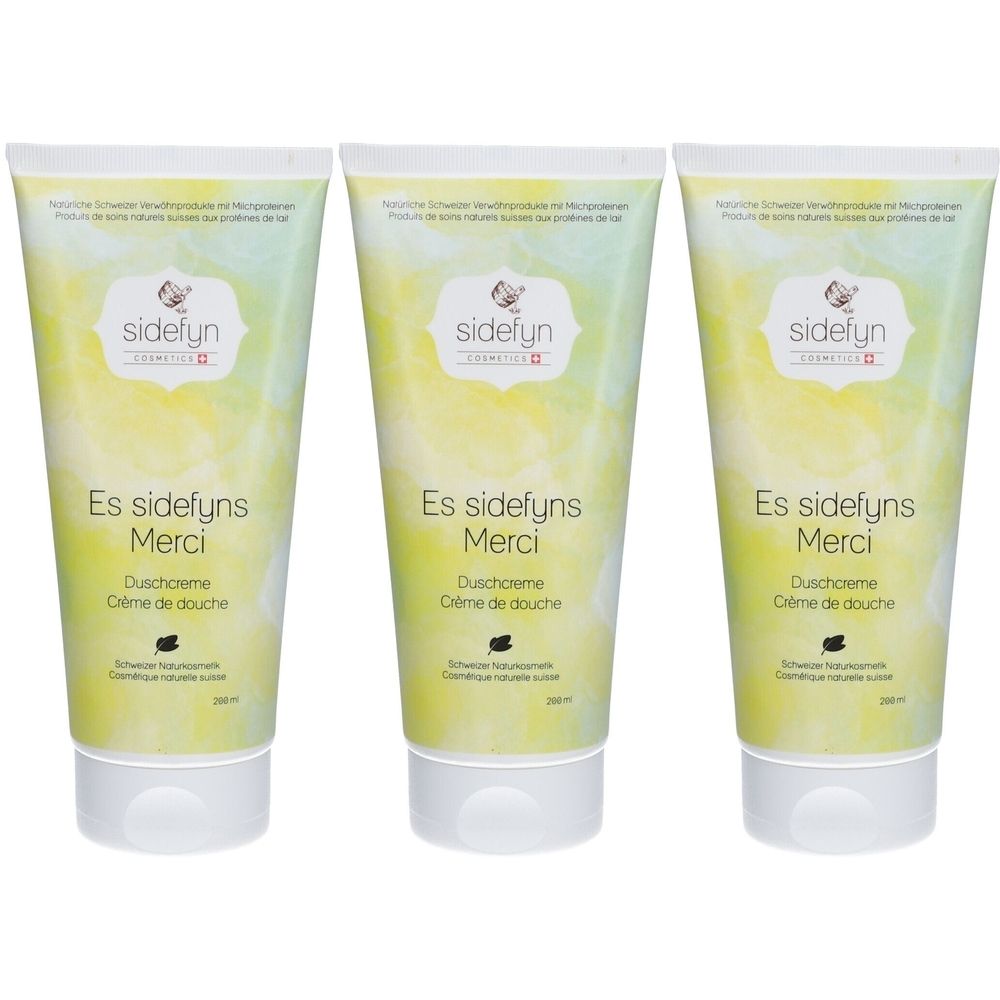 Drei Tuben Duschcreme mit Produktnamen und Logo. Farbverlauf von Gelb nach Grün. Text: Es sidefyns Merci, Crème de douche.