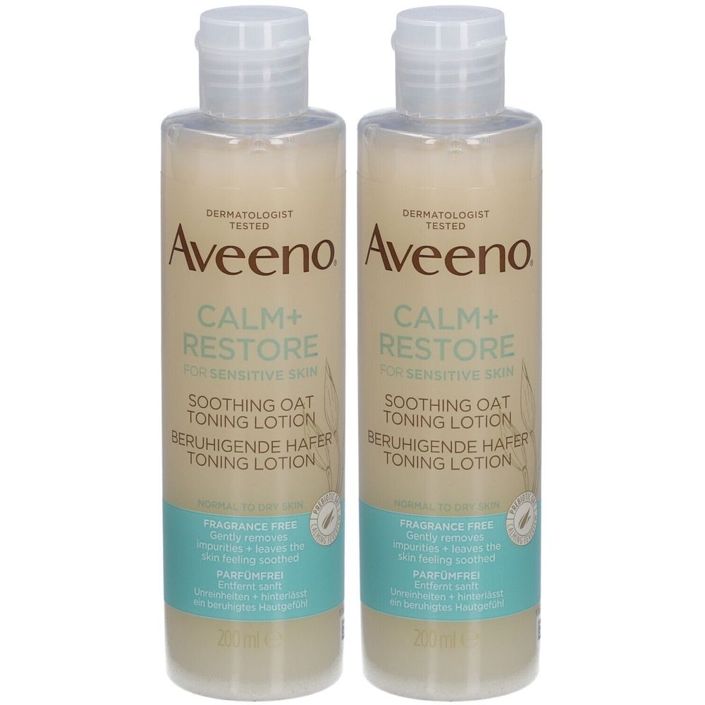 Deux flacons de lotion tonique Aveeno CALM+RESTORE. Bouchon blanc, flacon transparent, liquide brun clair, étiquettes bleues avec texte.