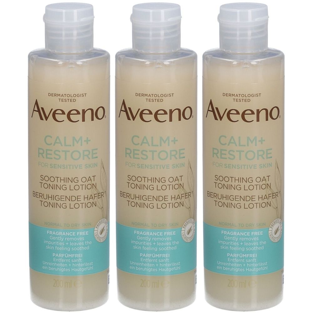 Trois flacons de lotion tonique Aveeno CALM+RESTORE. Flacons beiges avec bouchons blancs. Inscription: Lotion tonique apaisante à l'avoine, sans parfum.