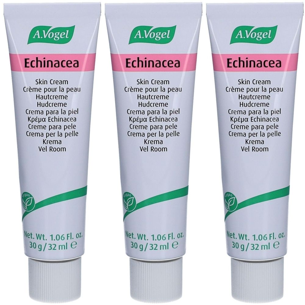 Trois tubes de crème pour la peau A. Vogel Echinacea. Tubes blancs avec bande rose et logo vert. Texte en plusieurs langues.