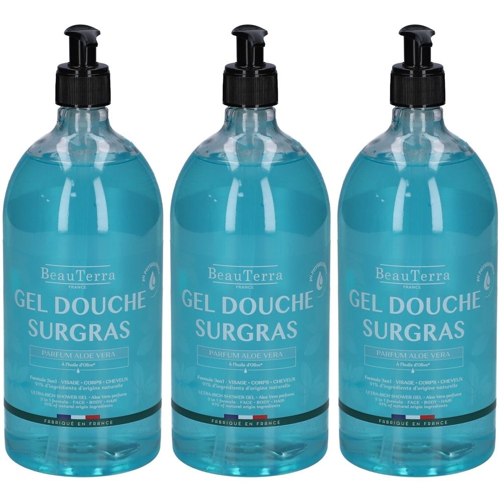 Drei Flaschen Duschgel mit schwarzem Pumpverschluss. Aufschrift: Gel Douche Surgras, Parfum Aloe Vera. Hergestellt in Frankreich.