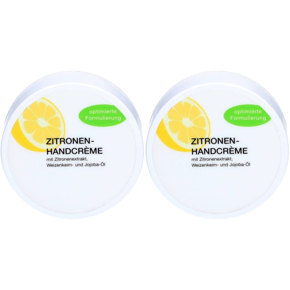 Deux pots ronds de crème pour les mains au citron. Inscription : ZITRONEN-HANDCRÈME. Avec citron, germe de blé et huile de jojoba. En haut : formulation optimisée.
