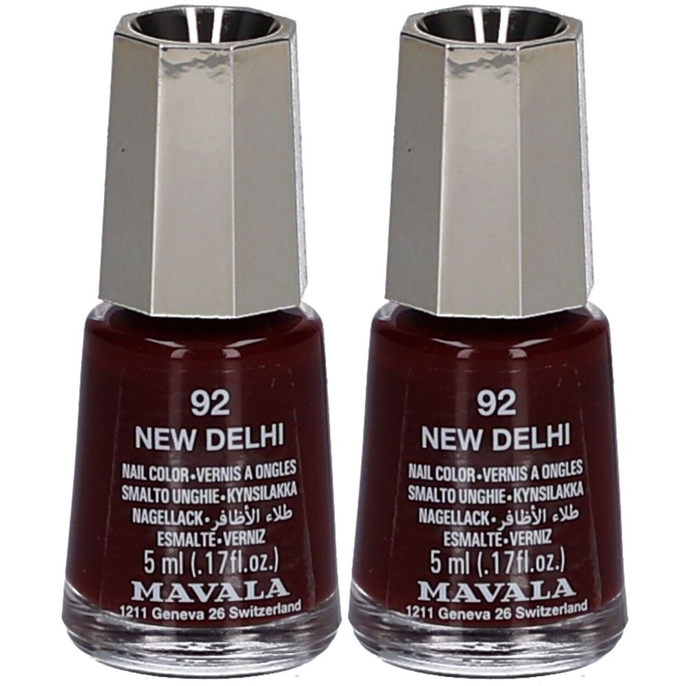 Zwei Flakons Nagellack, Farbe Dunkelrot. Aufschrift: 92 NEW DELHI, MAVALA. Metallkappe. 5 ml.