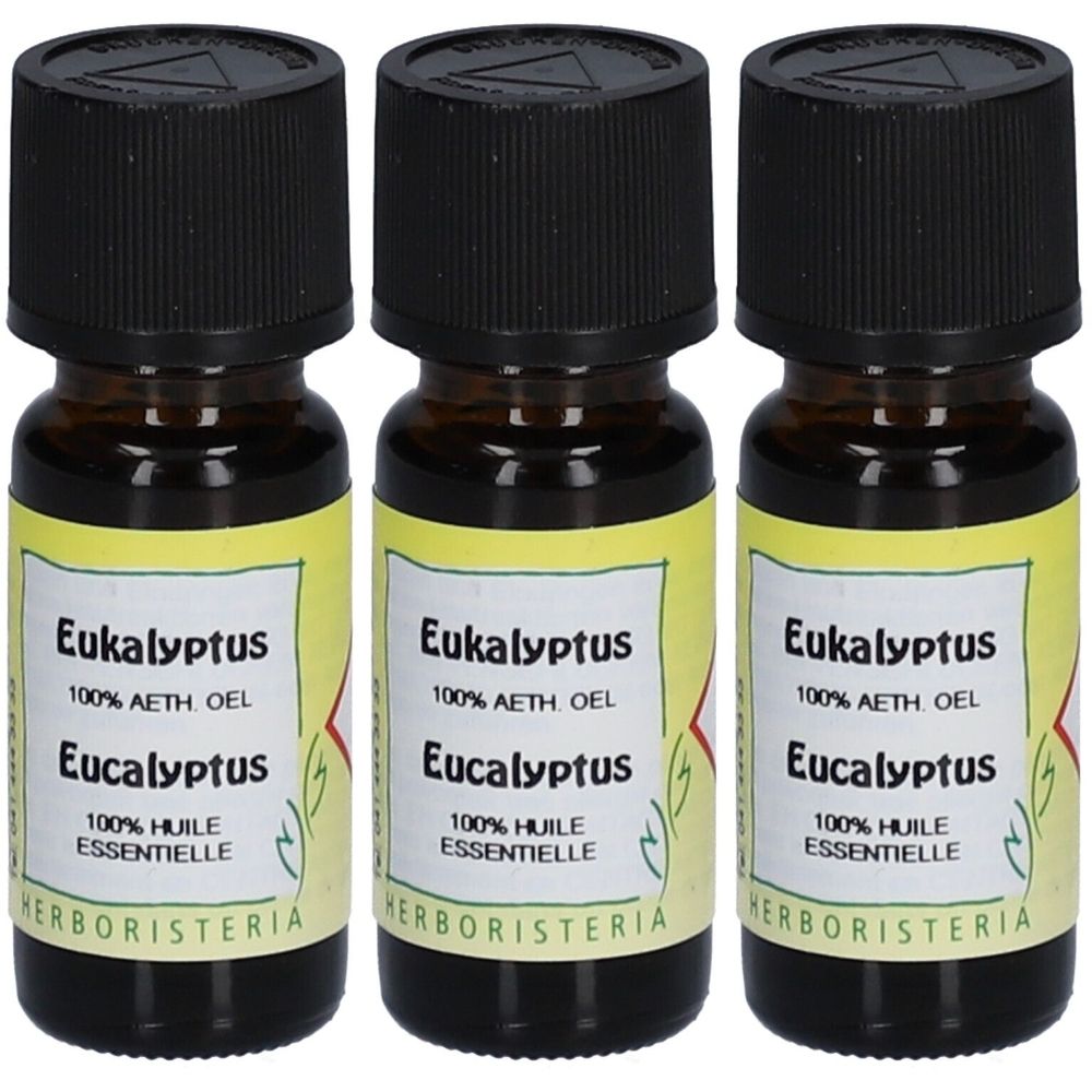 Trois flacons en verre brun avec bouchons noirs. Étiquette "Eukalyptus" et "100% AETH. OEL". Marque : HERBORISTERIA.