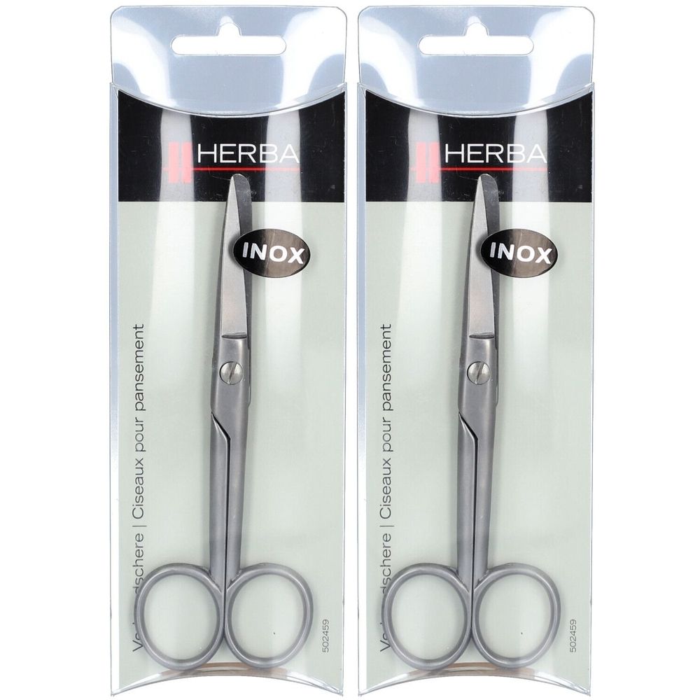 Deux ciseaux à pansement HERBA Inox en blister. Ciseaux métalliques à bouts arrondis. Inscription : INOX.