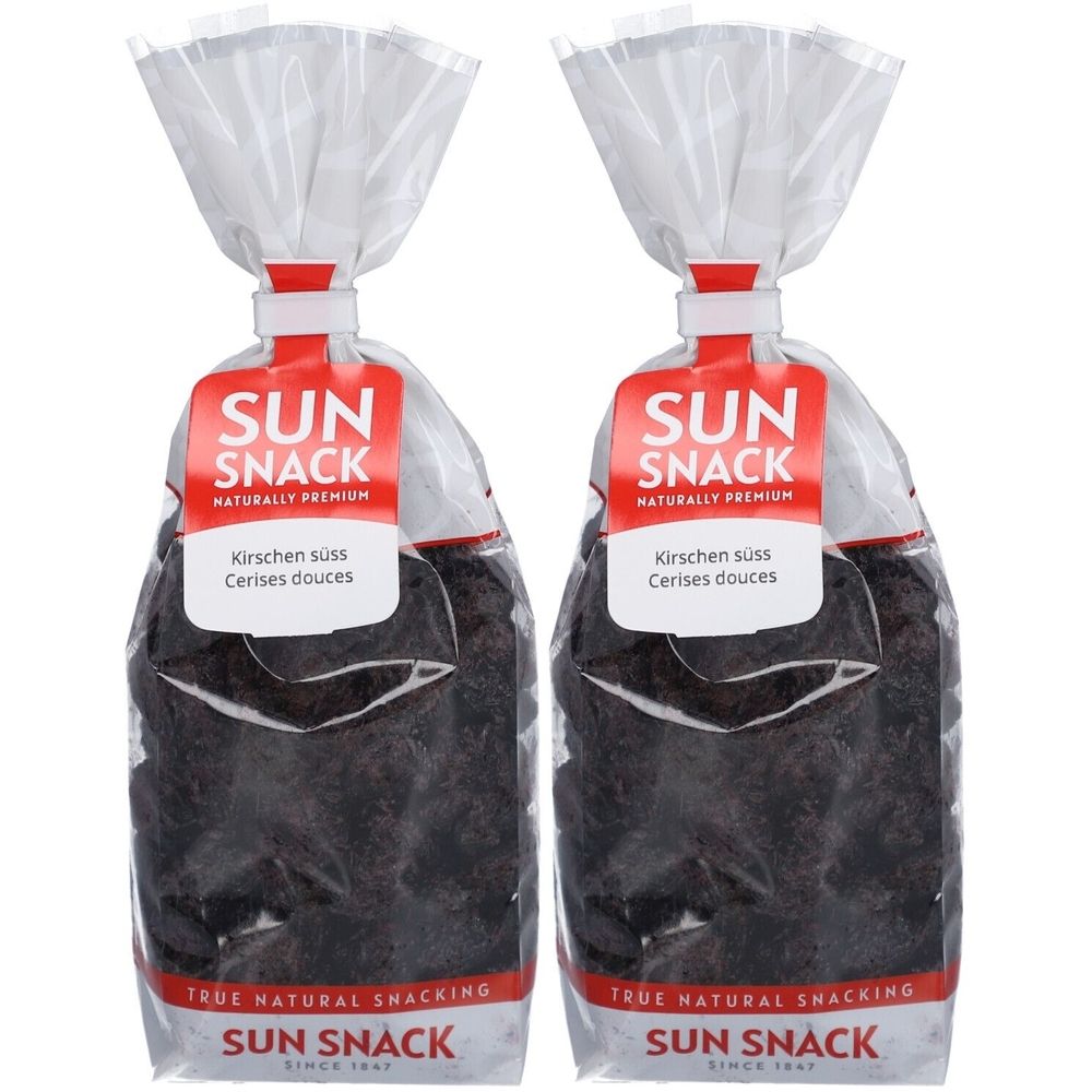 Zwei Beutel SUN SNACK Kirschen. Klarsichtverpackung mit rotem Etikett. Aufschrift: Kirschen süss, Cerises douces. Logo: SUN SNACK.