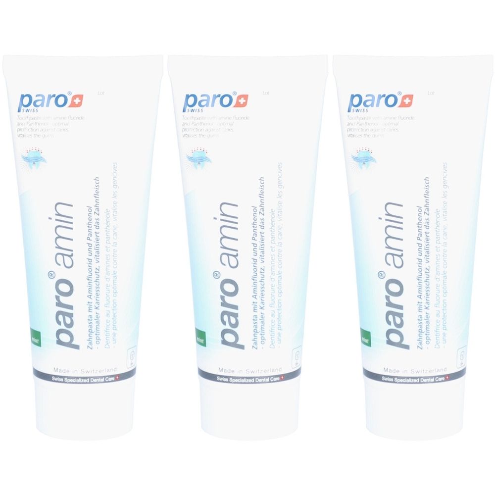 Drei Tuben Zahnpasta mit dem Logo "paro amin". Aufschrift: "Zahnpasta mit Amfluorid und Panthenol".