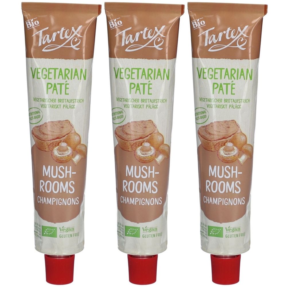 Drei Tuben Tartex Vegetarischer Brotaufstrich Champignons. Aufschrift: Vegetarian Paté, Mush-Rooms, Champignons. Bio-Siegel.