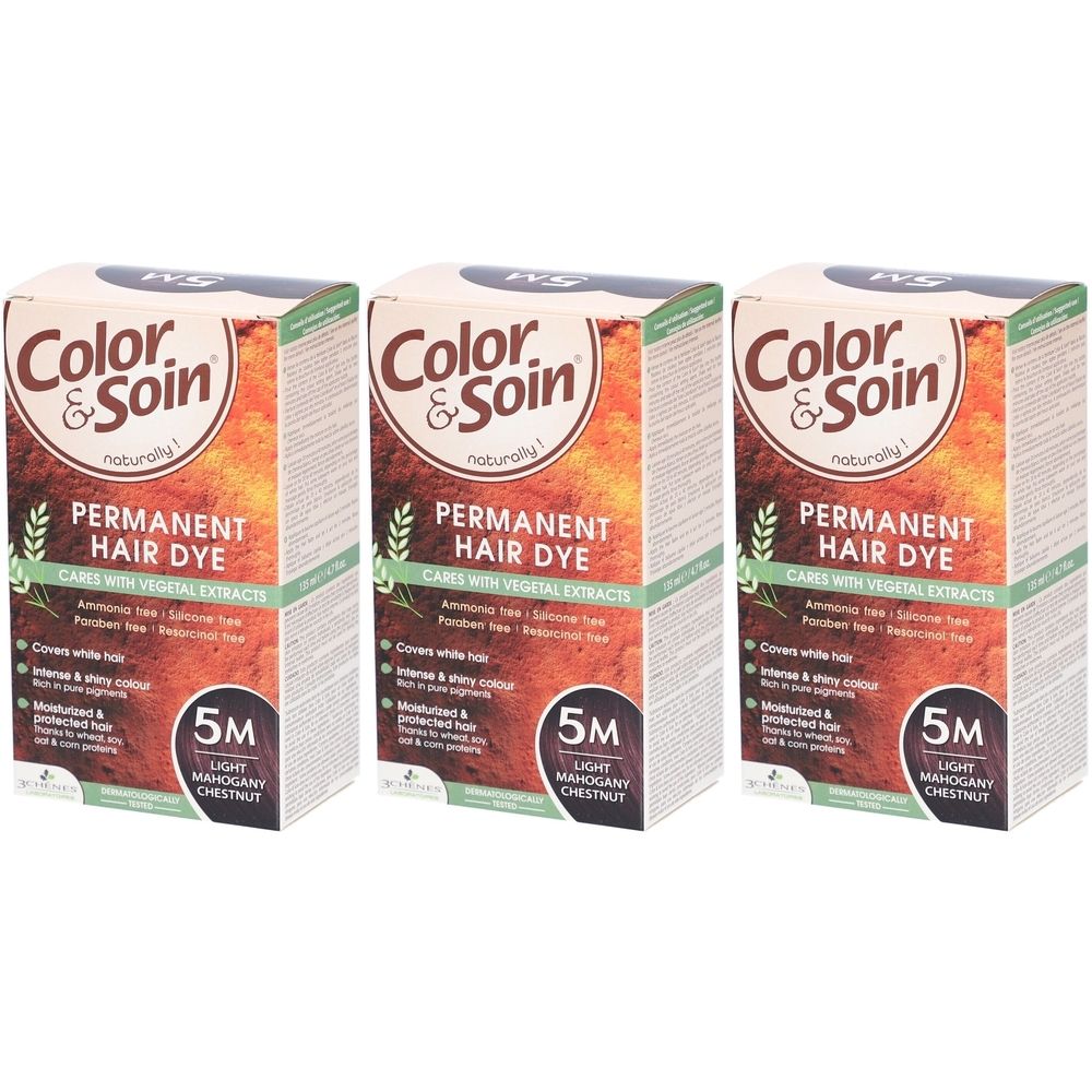 Drei Schachteln Color & Soin Permanent Hair Dye. Aufschrift: 5M Light Mahogany Chestnut. Mit Pflanzenextrakten.