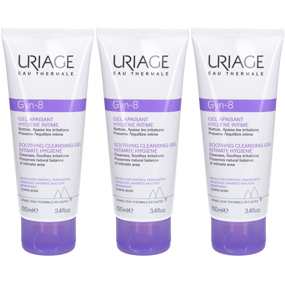 Drei Tuben Uriage Gyn-8 Gel. Weiße Tuben mit lila Akzenten und Schriftzug. Text: Gel apaisant, Hygiene intime, Soothing cleansing gel.