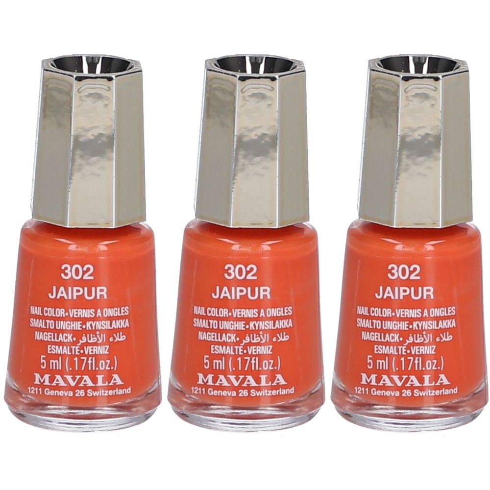 Trois flacons de vernis à ongles orange. Chaque flacon porte l'inscription "302 Jaipur", "MAVALA" et "5 ml". Les bouchons sont argentés.