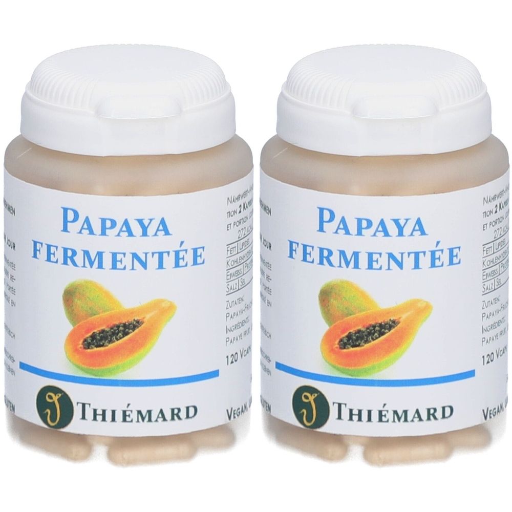 Zwei Flaschen mit weißem Deckel und Etikett. Aufschrift: Papaya Fermentée. Marke: THIÉMARD. Abbildung einer Papaya.
