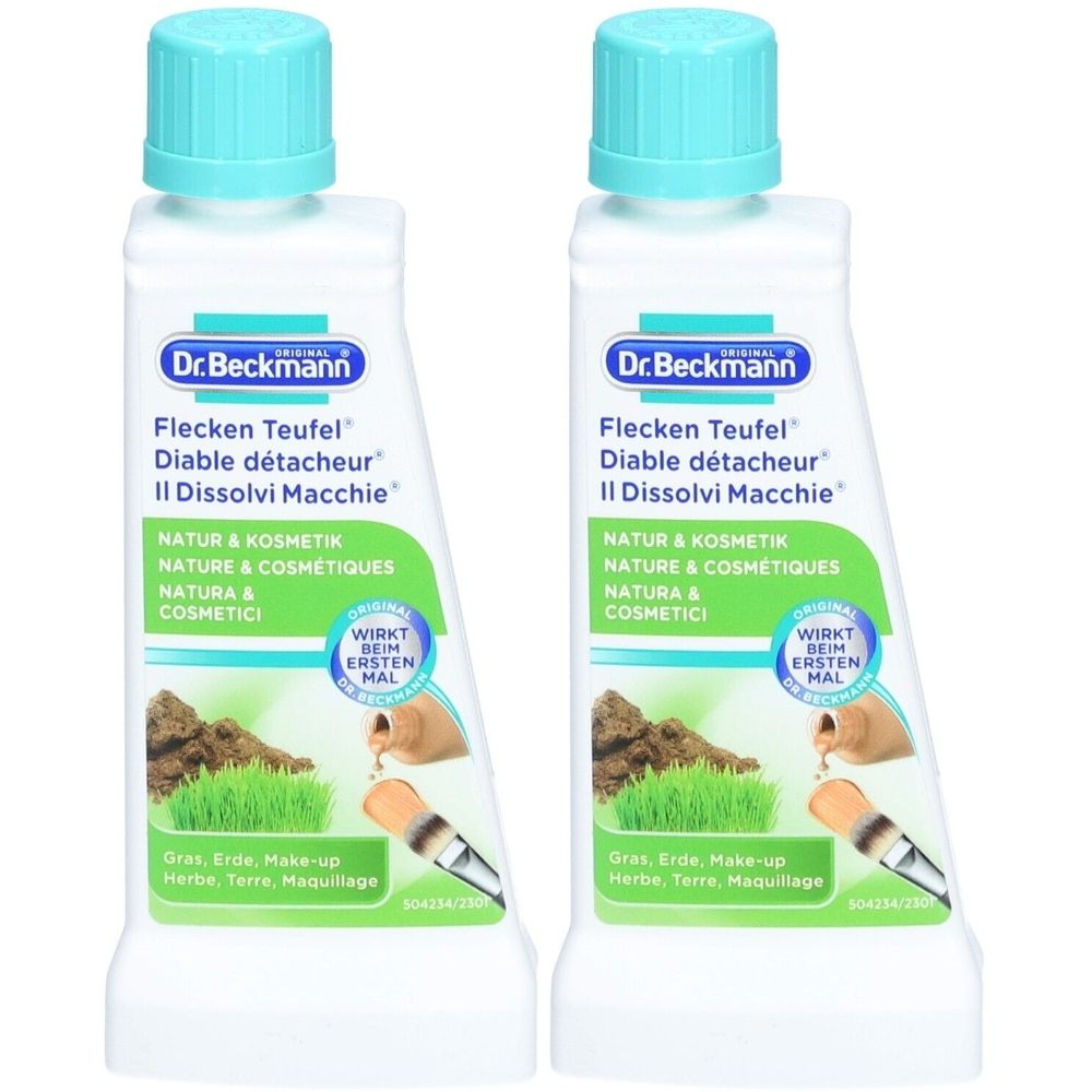 Deux flacons avec bouchons bleus. Inscription: Dr. Beckmann Flecken Teufel. Illustration: Herbe, Terre, Maquillage.