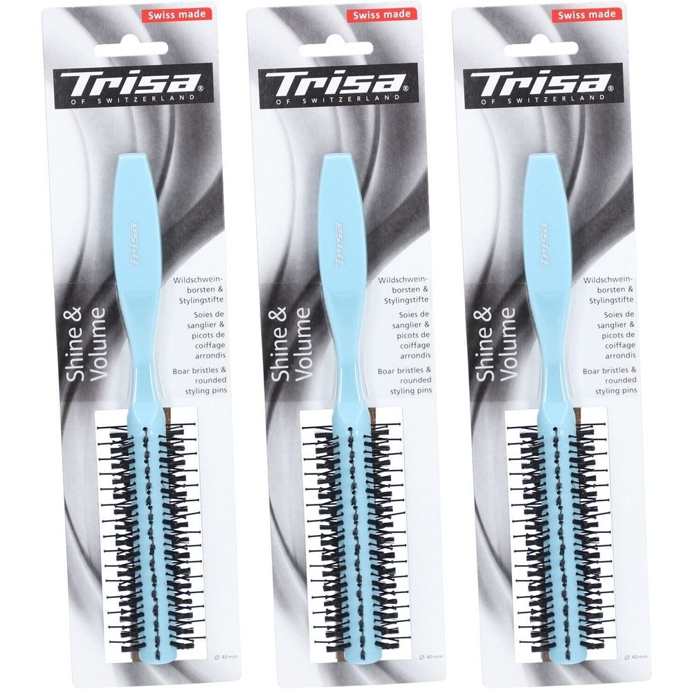 Drei Stylingbürsten in Verpackung. Hellblauer Griff, schwarze Borsten. Aufschrift: Trisa, Shine & Volume, Swiss made.
