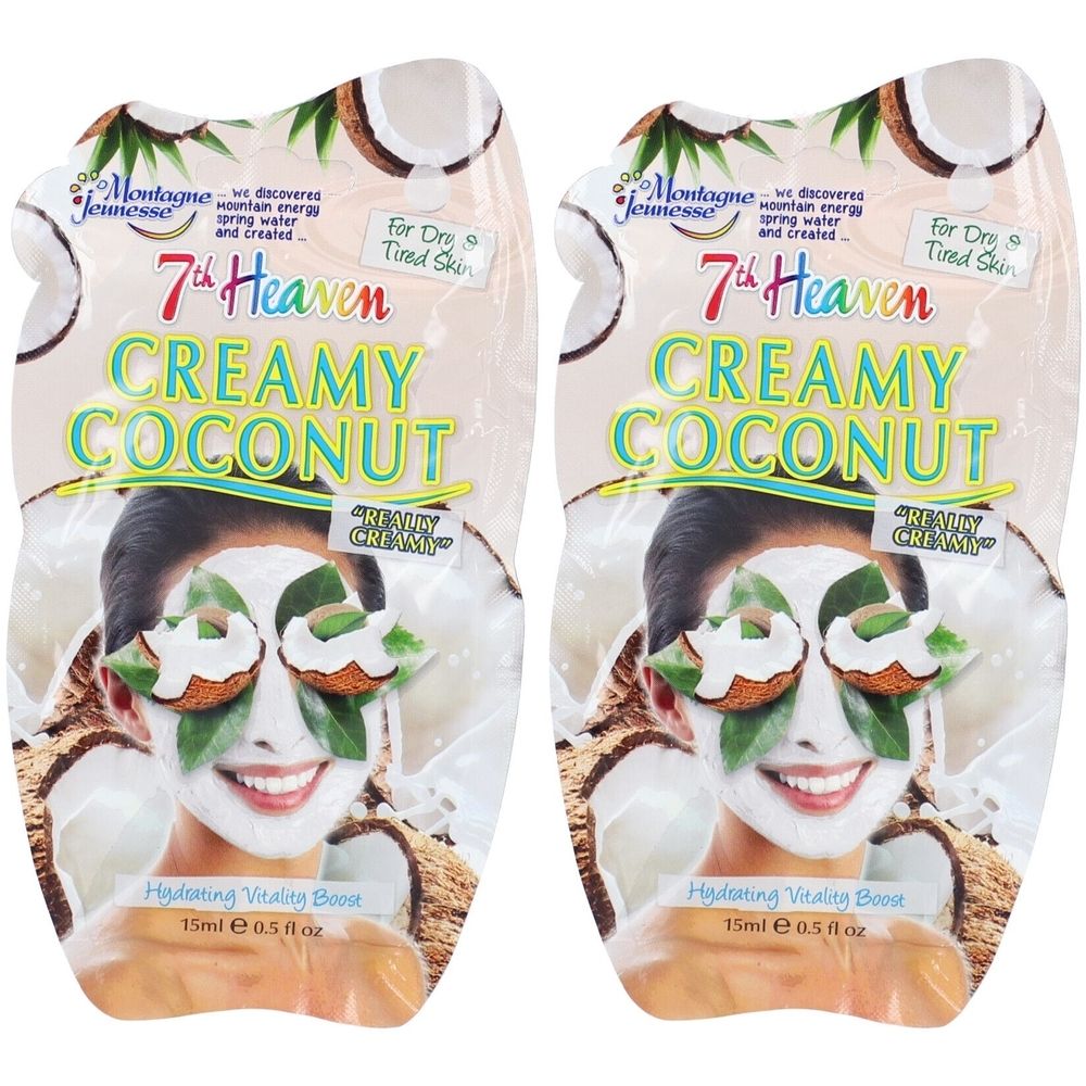 Zwei Packungen Gesichtsmaske. Aufschrift: 7th Heaven Creamy Coconut. Für trockene, müde Haut. Mit Kokosnuss-Motiv und Frauengesicht.