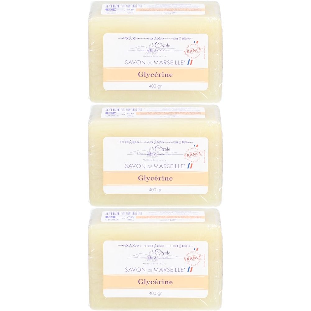 Trois blocs de savon emballés. Chaque bloc porte une étiquette avec "SAVON DE MARSEILLE" et "Glycérine". Poids : 400 gr.
