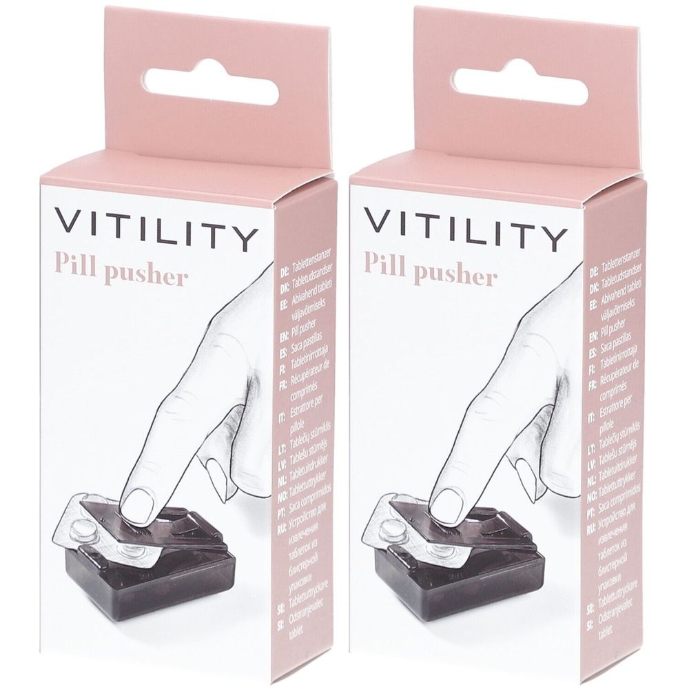 Zwei Packungen Tablettenextraktor. Aufschrift VITILITY Pill pusher. Rosa Verpackung mit Aufhängevorrichtung. Produktabbildung.