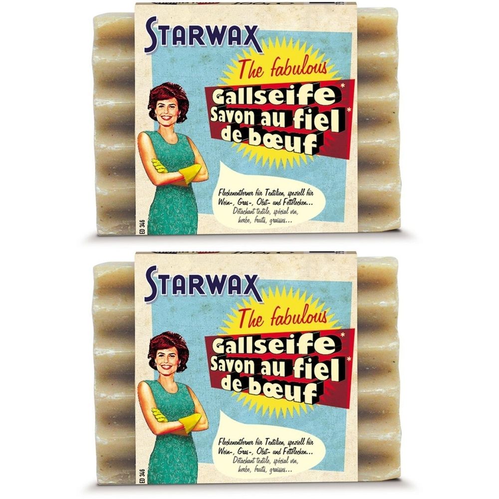 Zwei Blöcke Seife mit Verpackung. Aufschrift STARWAX, Gallseife, Savon au fiel de bœuf. Frau mit gelben Handschuhen.