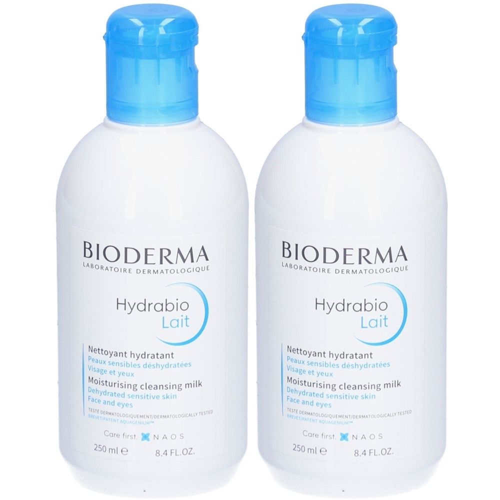 Deux flacons blancs avec bouchon bleu. Inscription: BIODERMA Hydrabio Lait, lait nettoyant hydratant. 250 ml.