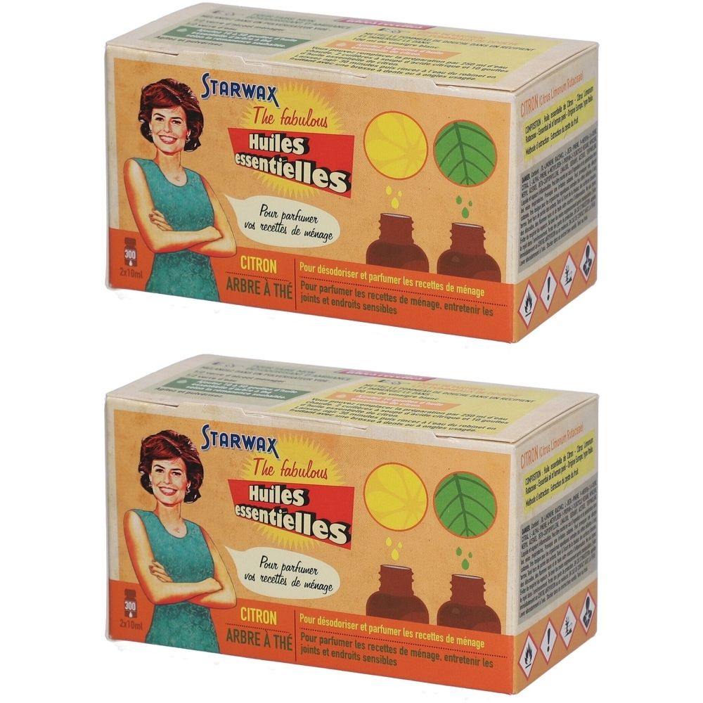 Zwei Kartons mit ätherischen Ölen. Aufdruck: Starwax, Huiles essentielles, Zitrone, Teebaum. Abbildung einer Frau.