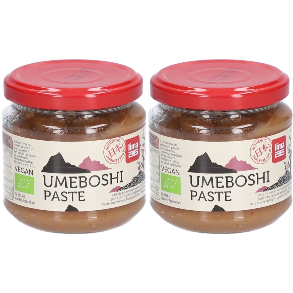 Deux pots de pâte d'Umeboshi avec couvercles rouges. L'étiquette indique "Umeboshi Paste" et "Vegan".