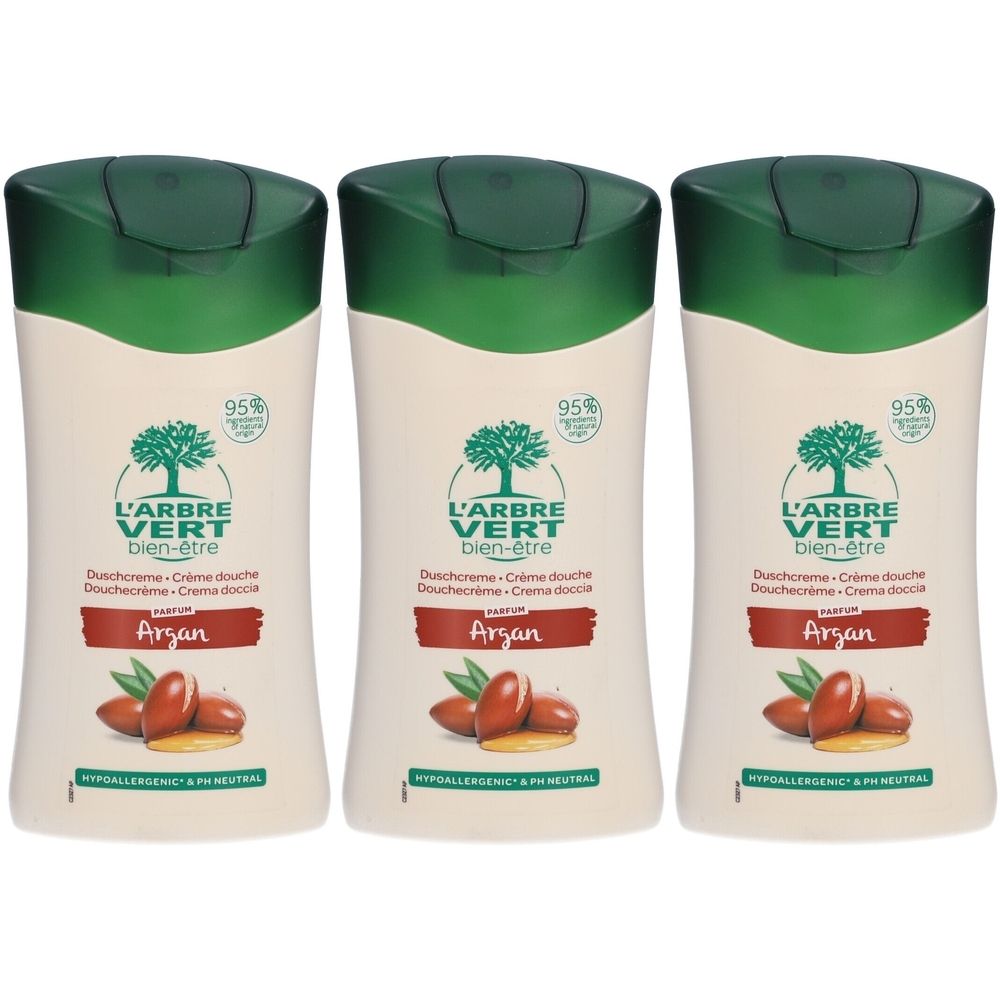 Trois flacons de gel douche avec bouchon vert. Inscription : L'ARBRE VERT bien-être, Argan. 95% d'ingrédients d'origine naturelle.