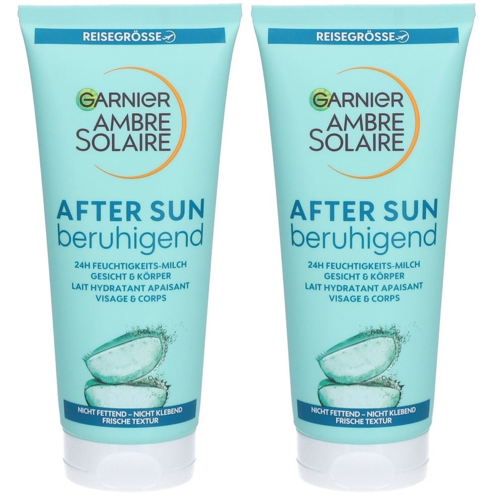 Zwei Tuben Garnier Ambre Solaire After Sun. Türkisgrüne Tuben mit weißem Verschluss. Aufschrift: After Sun beruhigend, 24h Feuchtigkeits-Milch.