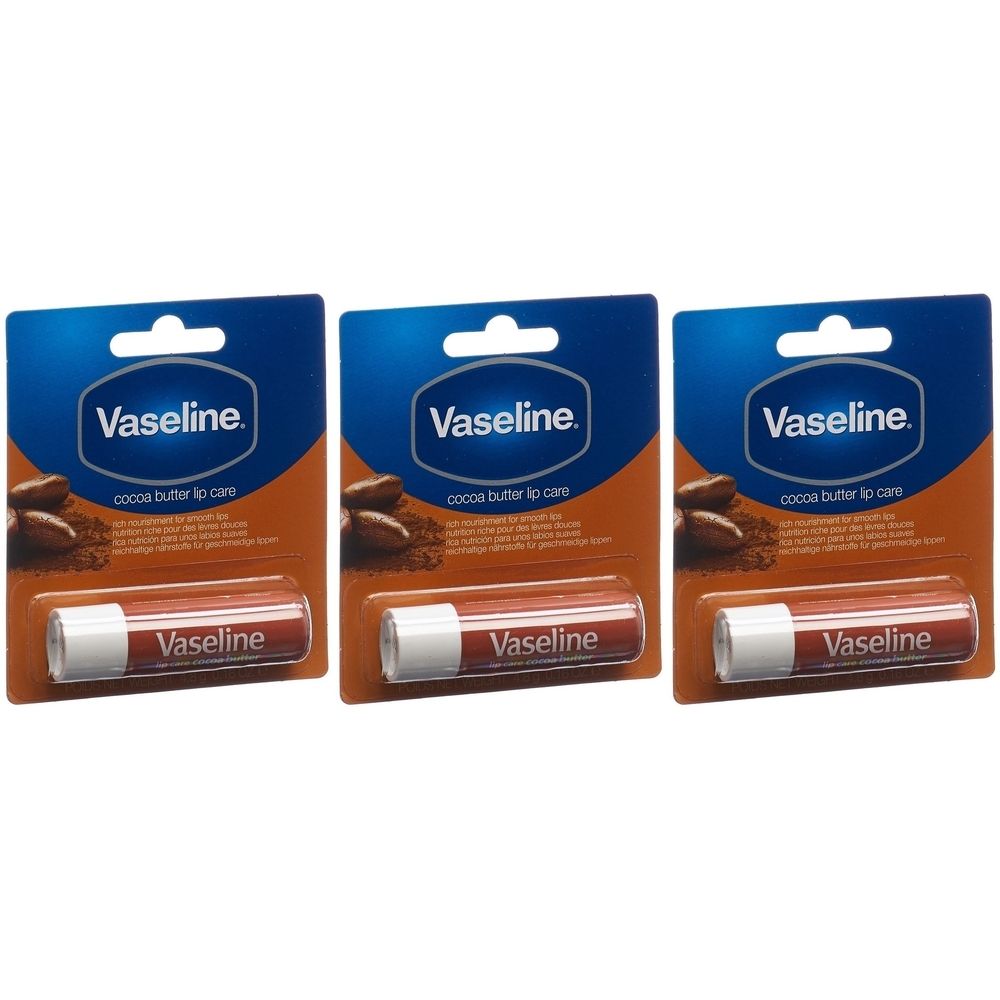 Drei Lippenbalsam-Sticks in Verpackung. Blaue Karte mit Vaseline-Logo und Kakaobutter-Hinweis. Roter Stick mit weißer Kappe, Vaseline-Schriftzug.